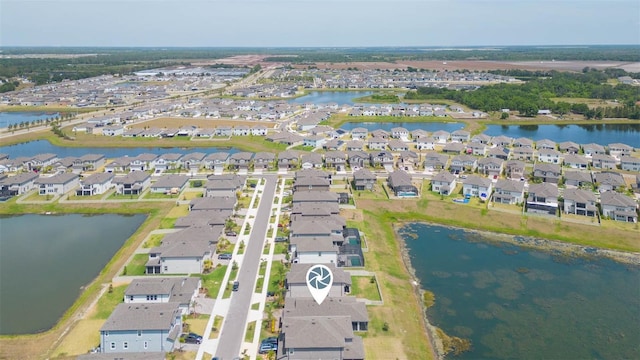 5059 Bromeliad Ave, Wimauma, FL 33598 - aerial view of property's location with nearby suburban area and a nearby body of water