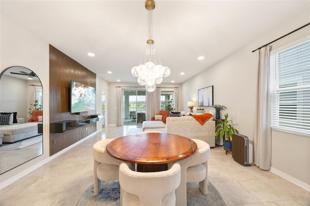 5059 Bromeliad Ave, Wimauma, FL 33598 - dining room with light tile patterned floors, recessed lighting, a chandelier, and baseboards
