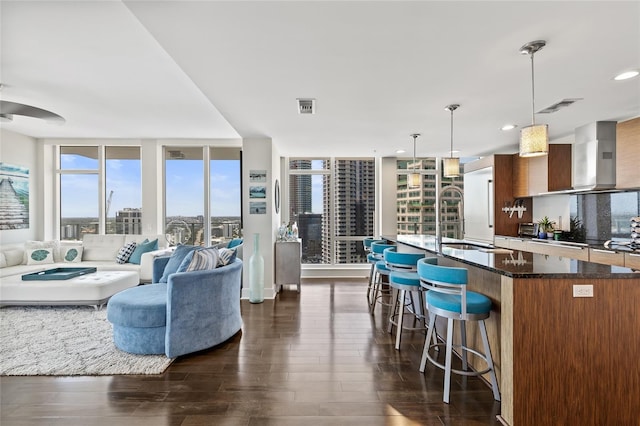 175 1st St S Unit 2603, Saint Petersburg, FL 33701 - living room with visible vents, recessed lighting, and dark wood finished floors