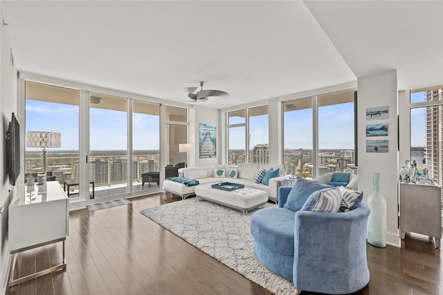 175 1st St S Unit 2603, Saint Petersburg, FL 33701 - living area featuring a wall of windows and dark wood-style floors