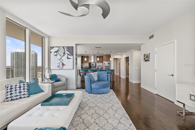 175 1st St S Unit 2603, Saint Petersburg, FL 33701 - living area with recessed lighting, ceiling fan, dark wood-type flooring, visible vents, and baseboards