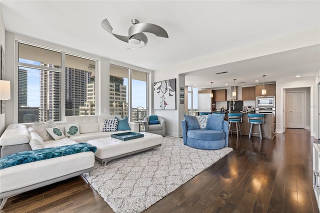 175 1st St S Unit 2603, Saint Petersburg, FL 33701 - living area featuring ceiling fan, recessed lighting, dark wood-style floors, and baseboards