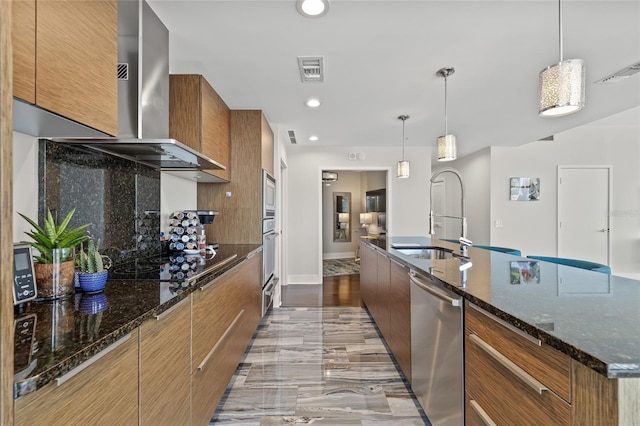 175 1st St S Unit 2603, Saint Petersburg, FL 33701 - kitchen featuring modern cabinets, a sink, stainless steel appliances, brown cabinetry, and visible vents