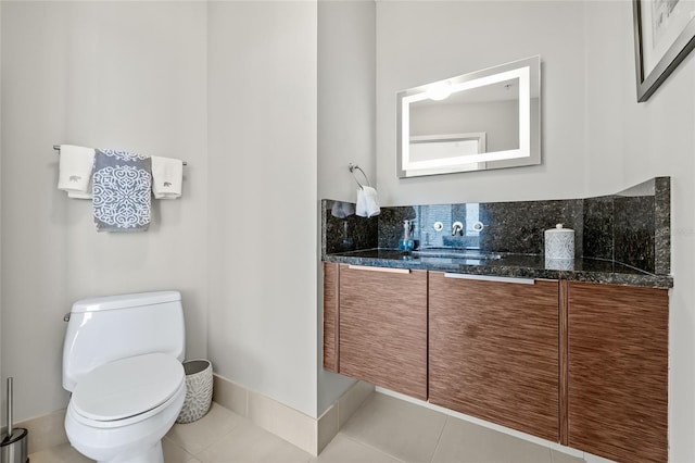 175 1st St S Unit 2603, Saint Petersburg, FL 33701 - bathroom with tile patterned floors, vanity, and toilet