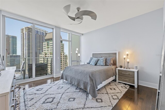 175 1st St S Unit 2603, Saint Petersburg, FL 33701 - bedroom with a city view, ceiling fan, wood finished floors, and baseboards