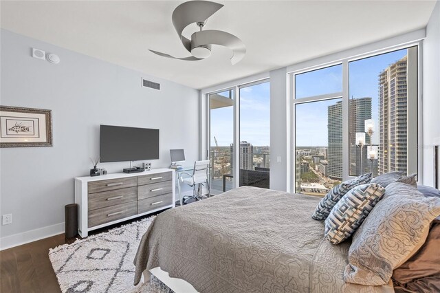 175 1st St S Unit 2603, Saint Petersburg, FL 33701 - bedroom featuring visible vents, ceiling fan, baseboards, wood finished floors, and access to outside