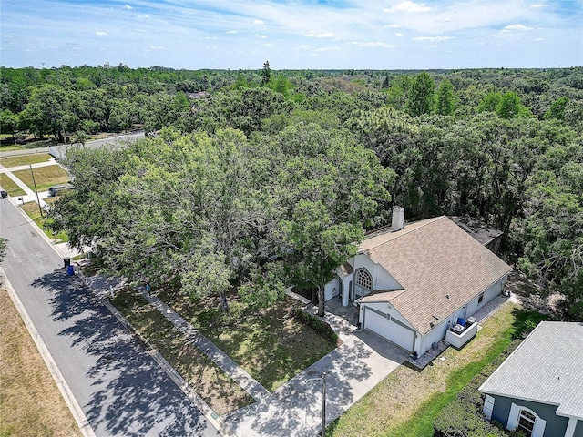 6410 Beaver Way, Tampa, FL 33625 - bird's eye view featuring a wooded view