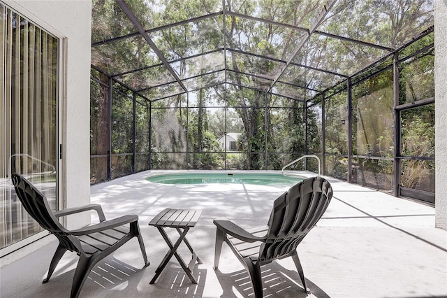6410 Beaver Way, Tampa, FL 33625 - outdoor pool featuring a patio and glass enclosure