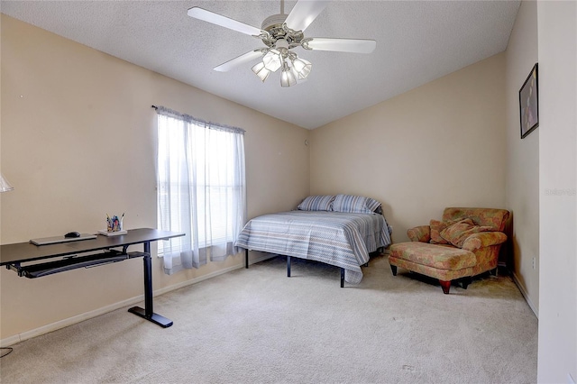 6410 Beaver Way, Tampa, FL 33625 - bedroom with baseboards, carpet flooring, a textured ceiling, and ceiling fan
