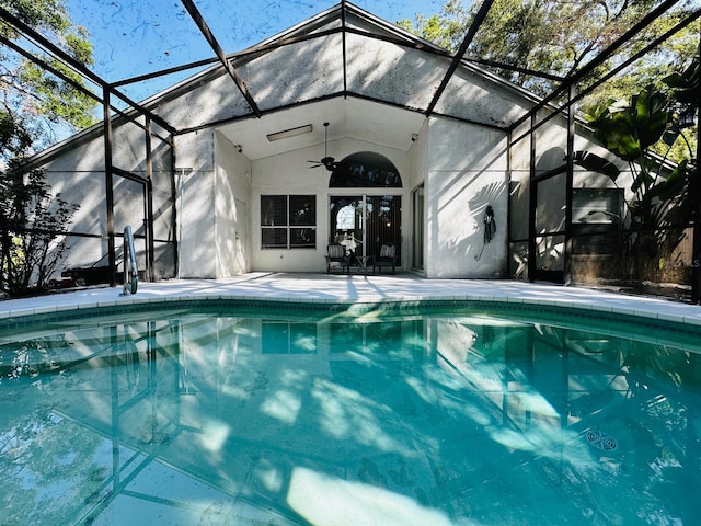 6410 Beaver Way, Tampa, FL 33625 - outdoor pool with a ceiling fan, glass enclosure, and a patio area