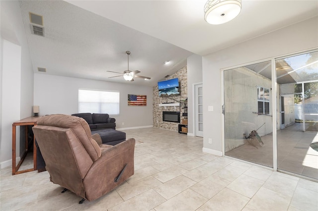1916 Sandstone Pl, Clearwater, FL 33760 - living area featuring visible vents, lofted ceiling, baseboards, a ceiling fan, and light tile patterned floors
