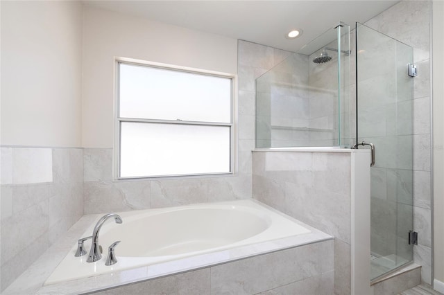 1916 Sandstone Pl, Clearwater, FL 33760 - full bath featuring a garden tub, recessed lighting, and a stall shower