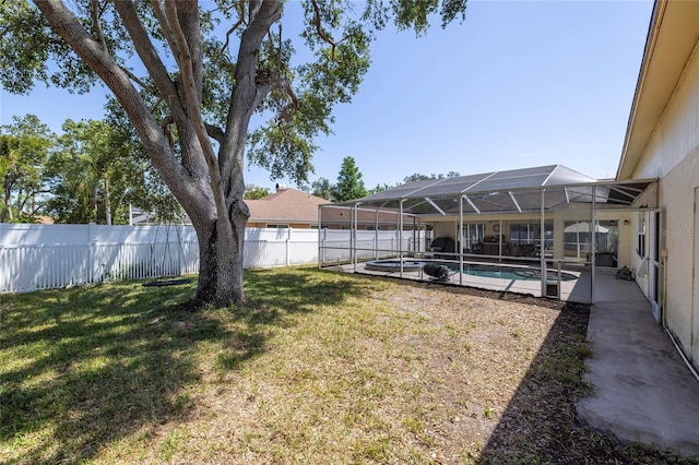 1916 Sandstone Pl, Clearwater, FL 33760 - view of yard with a fenced backyard, a fenced in pool, a lanai, and a patio