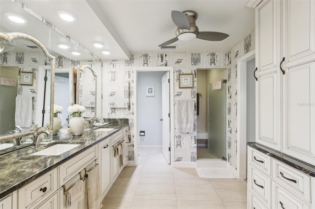 full bathroom with tile patterned flooring, ceiling fan, a sink, and double vanity