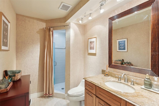 full bathroom featuring toilet, vanity, visible vents, tile patterned flooring, and a shower stall