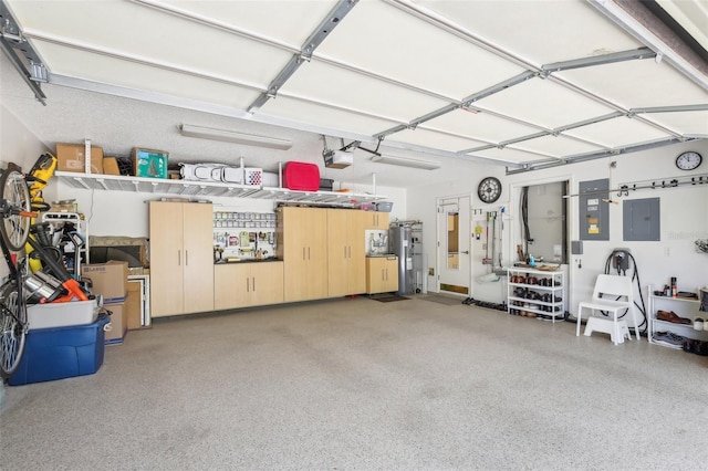 garage featuring electric panel and a garage door opener