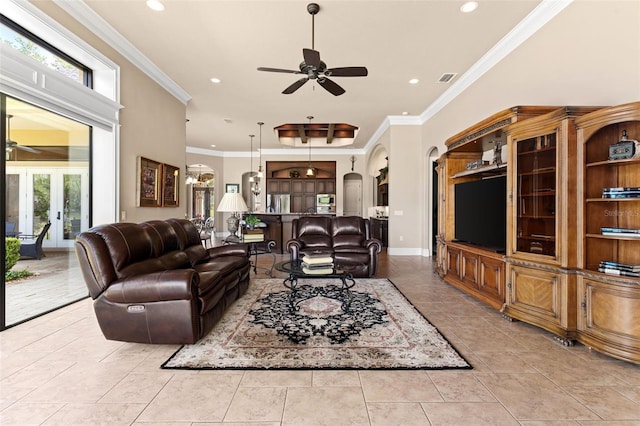 living room featuring crown molding, recessed lighting, arched walkways, and ceiling fan