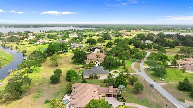 aerial view featuring a residential view and a water view