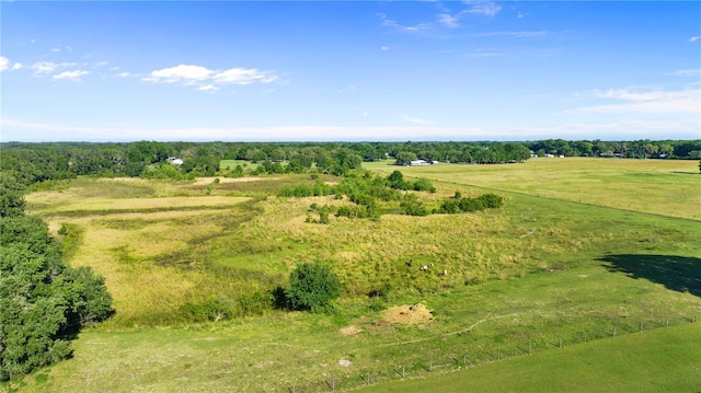 birds eye view of property featuring a rural view