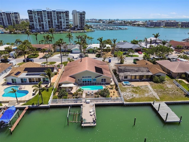 17 Bellevue Dr, Treasure Island, FL 33706 - drone / aerial view of a pool area and a large body of water