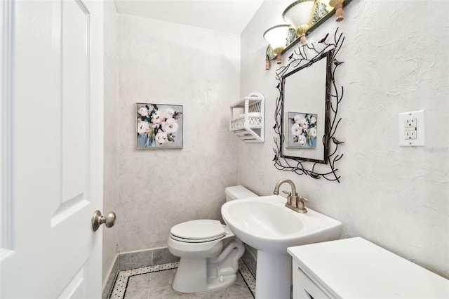 17 Bellevue Dr, Treasure Island, FL 33706 - half bathroom with toilet and baseboards