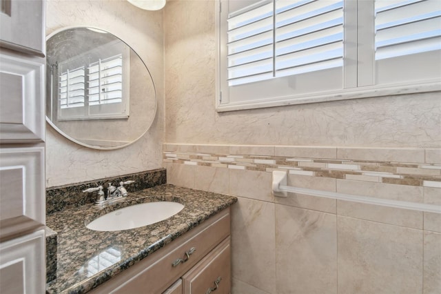 17 Bellevue Dr, Treasure Island, FL 33706 - bathroom with vanity and tile walls