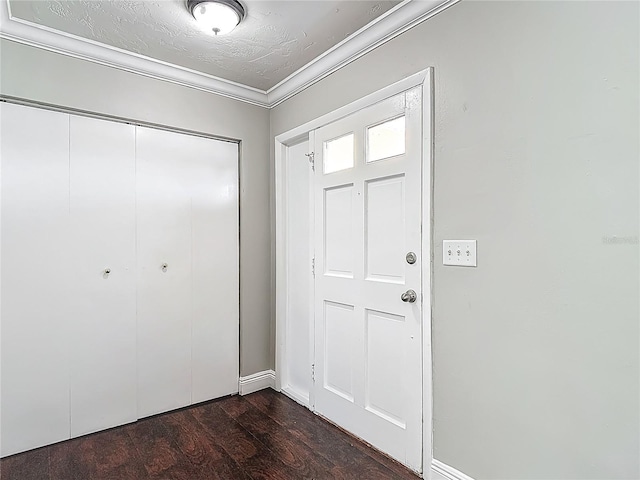 7280 Tarrytown Dr, Spring Hill, FL 34606 - entryway featuring ornamental molding, dark wood-style floors, and baseboards
