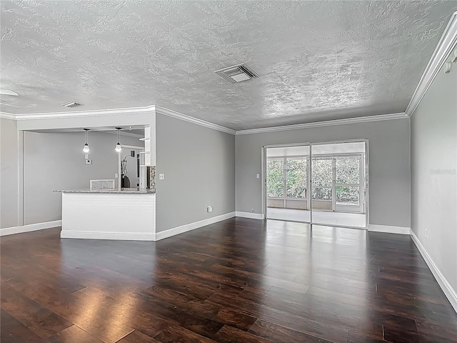 7280 Tarrytown Dr, Spring Hill, FL 34606 - unfurnished living room with dark wood finished floors, visible vents, a textured ceiling, and baseboards