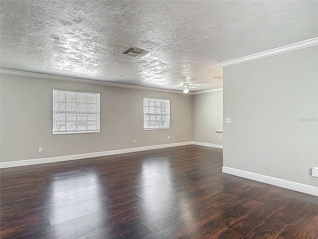 7280 Tarrytown Dr, Spring Hill, FL 34606 - spare room featuring visible vents, baseboards, ornamental molding, wood finished floors, and a ceiling fan