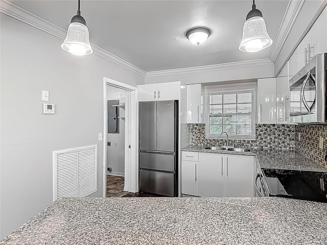 7280 Tarrytown Dr, Spring Hill, FL 34606 - kitchen featuring white cabinets, a sink, visible vents, stainless steel appliances, and stone counters