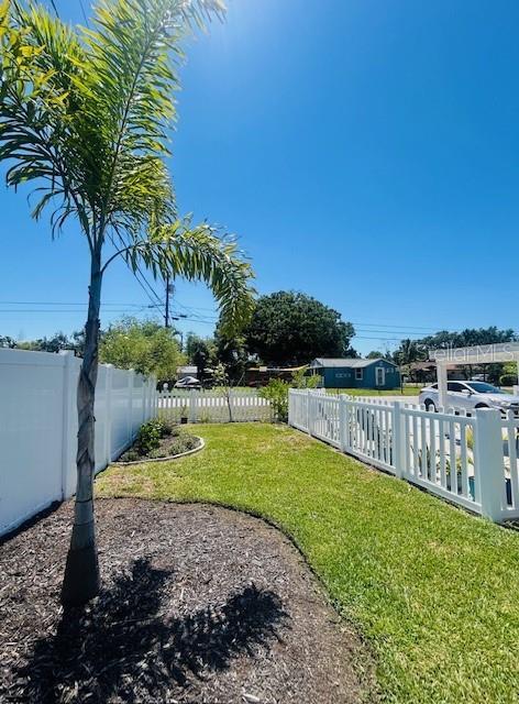 6401 30th Way N, Saint Petersburg, FL 33702 - view of yard with fence private yard