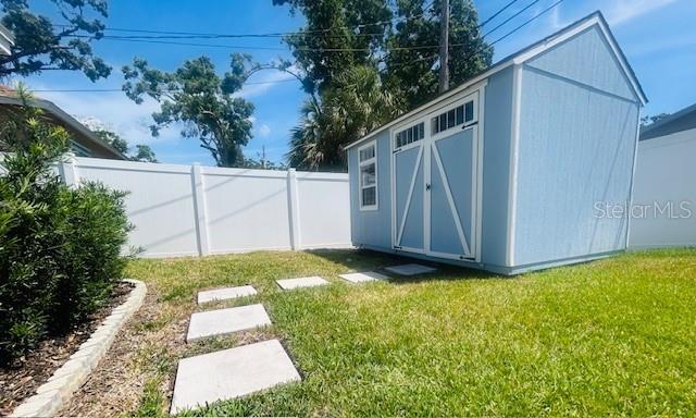 6401 30th Way N, Saint Petersburg, FL 33702 - view of shed featuring a fenced backyard