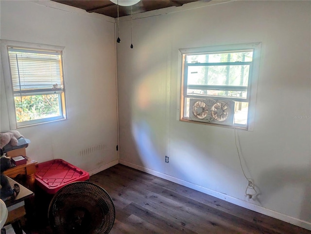 37654 Eiland Blvd, Zephyrhills, FL 33542 - misc room featuring a wealth of natural light, wood finished floors, and baseboards