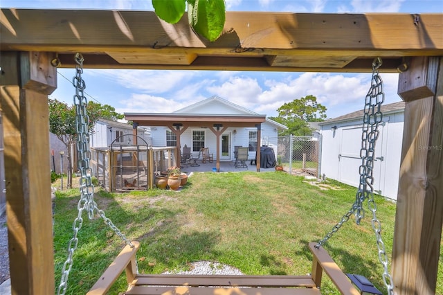 view of yard featuring a patio area and a fenced backyard
