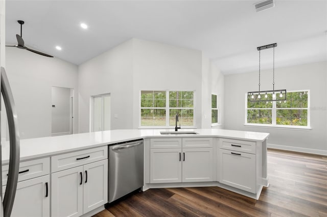 kitchen with visible vents, a sink, light countertops, and stainless steel appliances