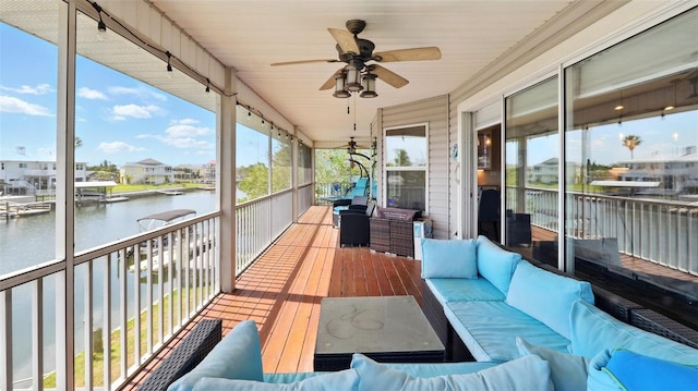 4396 5th Isle Dr, Hernando Beach, FL 34607 - exterior space with a water view, a residential view, outdoor lounge area, and a ceiling fan