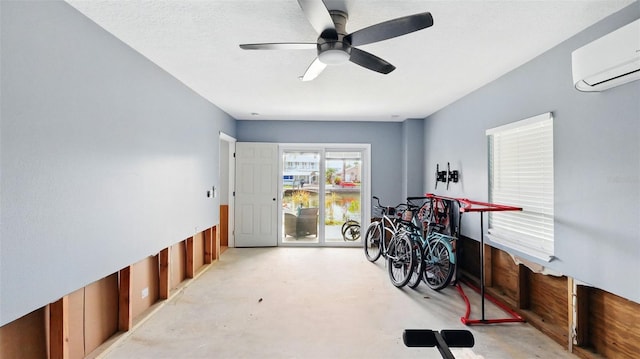 4396 5th Isle Dr, Hernando Beach, FL 34607 - misc room featuring a ceiling fan, finished concrete flooring, and a wall unit AC