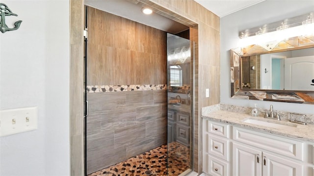 4396 5th Isle Dr, Hernando Beach, FL 34607 - bathroom featuring vanity and a tile shower