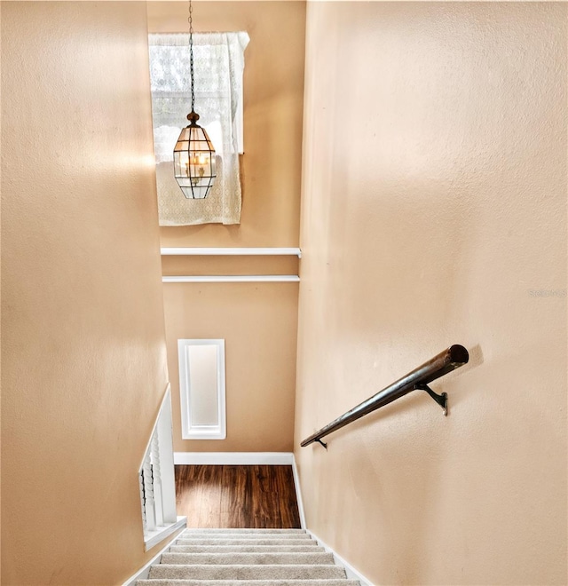 771 Murphy Ave N, Saint Petersburg, FL 33703 - stairway with wood finished floors and baseboards