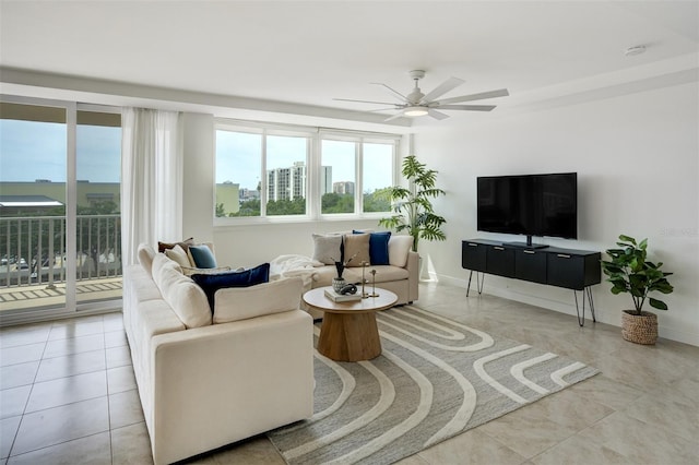 223 Island Way Unit 5D, Clearwater Beach, FL 33767 - living area with tile patterned flooring and a ceiling fan