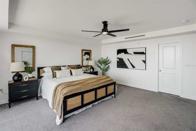 223 Island Way Unit 5D, Clearwater Beach, FL 33767 - bedroom with baseboards, visible vents, ceiling fan, and light colored carpet