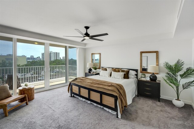 223 Island Way Unit 5D, Clearwater Beach, FL 33767 - bedroom with baseboards, carpet, ceiling fan, and access to exterior