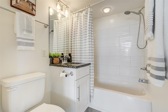 223 Island Way Unit 5D, Clearwater Beach, FL 33767 - bathroom featuring toilet, shower / bath combo, and vanity