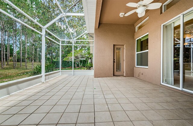 617 Glastonbury Ct, Spring Hill, FL 34609 - unfurnished sunroom with a ceiling fan