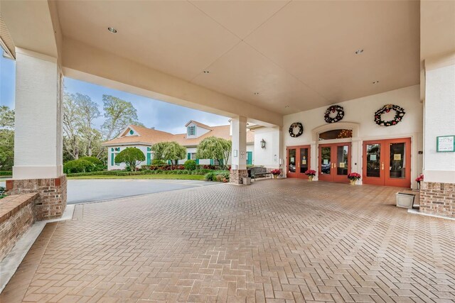 617 Glastonbury Ct, Spring Hill, FL 34609 - view of patio with french doors
