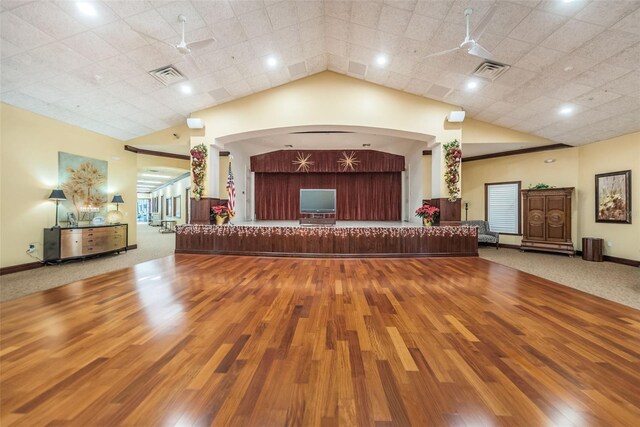 617 Glastonbury Ct, Spring Hill, FL 34609 - reception with a ceiling fan, arched walkways, vaulted ceiling, and stairs