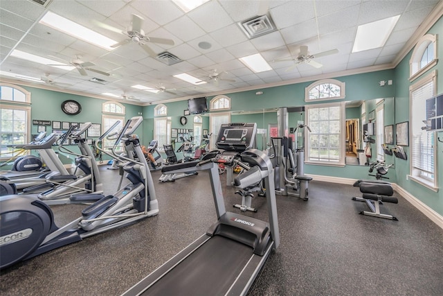 617 Glastonbury Ct, Spring Hill, FL 34609 - exercise room with healthy amount of natural light, a paneled ceiling, ceiling fan, baseboards, and crown molding
