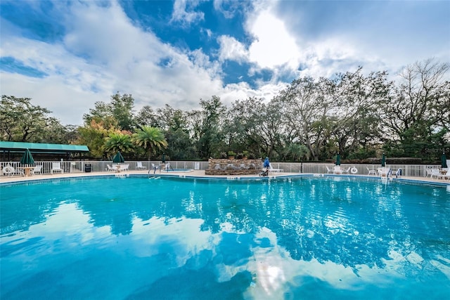 617 Glastonbury Ct, Spring Hill, FL 34609 - community pool featuring fence