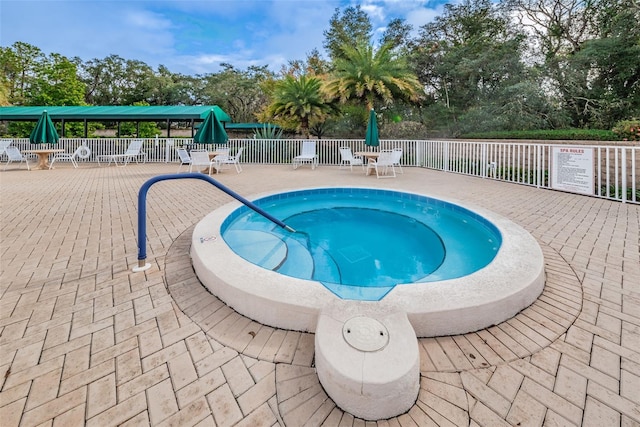 617 Glastonbury Ct, Spring Hill, FL 34609 - view of pool with fence, a patio, and view of scattered trees