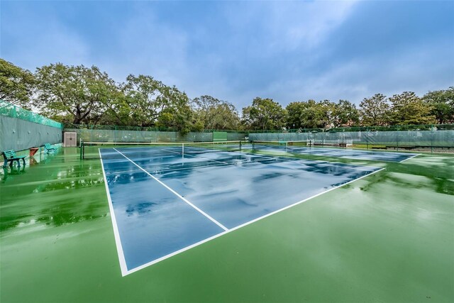 617 Glastonbury Ct, Spring Hill, FL 34609 - view of tennis court featuring fence
